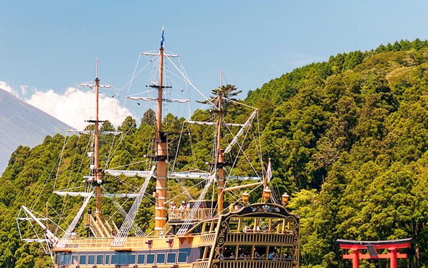 Pirate ship on Lake Ashi with red torii gate, Hakone.