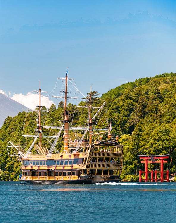 Pirate ship on Lake Ashi with red torii gate, Hakone.