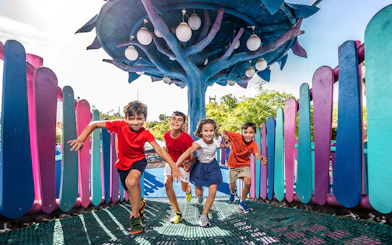 Children playing at Isla Mágica amusement park, Seville, Spain.