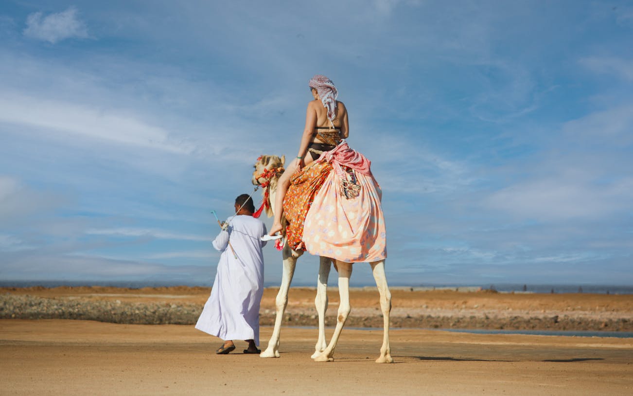 Camel ride in Hurghada desert during Super Safari tour.