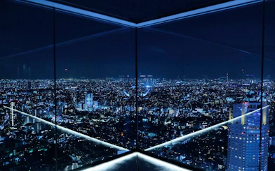 Tokyo cityscape view from Shibuya Sky observation deck at night.