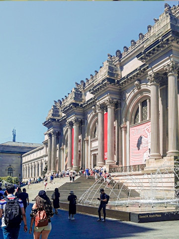 Visitors at the entrance of The Metropolitan Museum of Art, New York City.