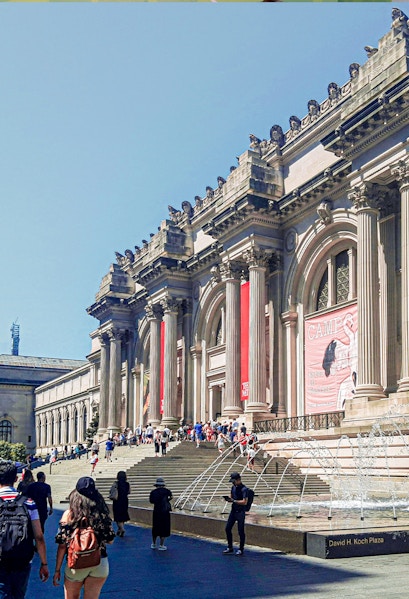 Visitors at the entrance of The Metropolitan Museum of Art, New York City.