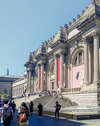 Visitors at the entrance of The Metropolitan Museum of Art, New York City.