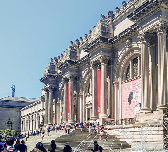 Visitors at the entrance of The Metropolitan Museum of Art, New York City.