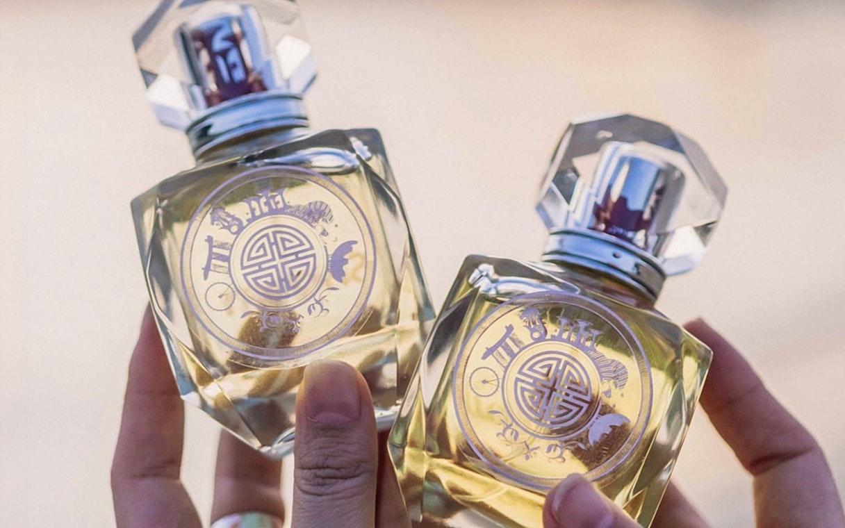 Perfume bottles with intricate designs, part of Go City Singapore All-Inclusive Pass attractions.