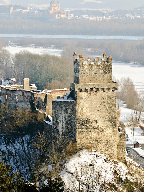 Ruins of Dürnstein Castle overlooking snowy Danube Valley, Austria, in winter.