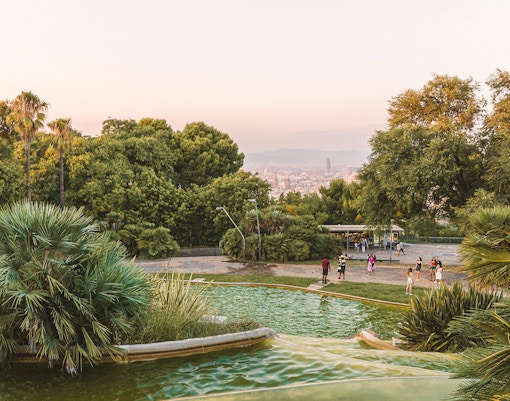 Jardins del Mirador in Montjuic overlooking Barcelona cityscape.