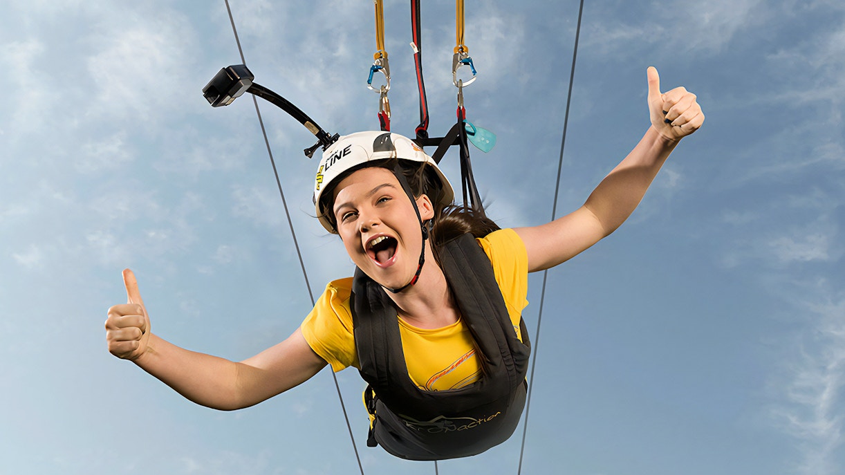 Kid doing the Young Adventurer XLine Dubai Marina Zip Line