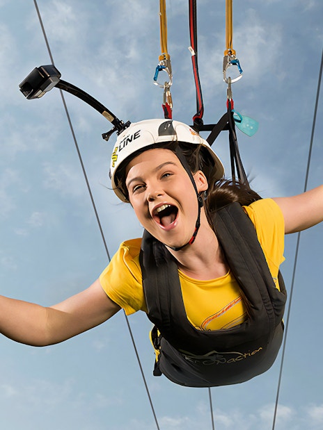 Kid enjoying the Young Adventurer XLine zip line in Dubai Marina.
