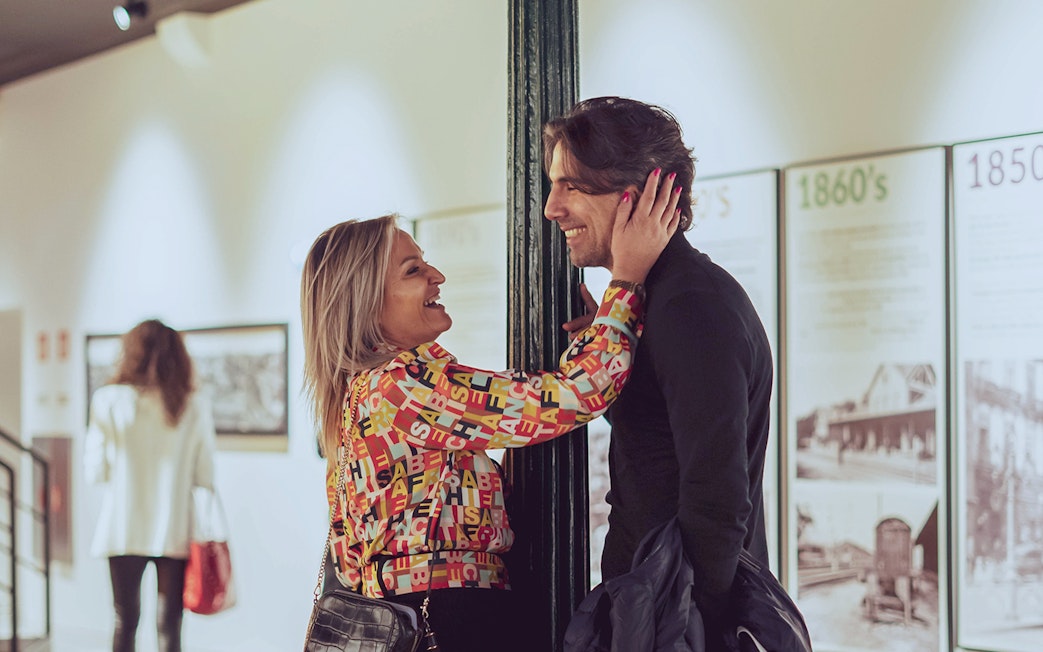 Couple enjoying Porto Region Across The Ages museum exhibit.