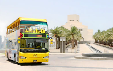 Open-top tour bus near Museum of Islamic Art in Doha.