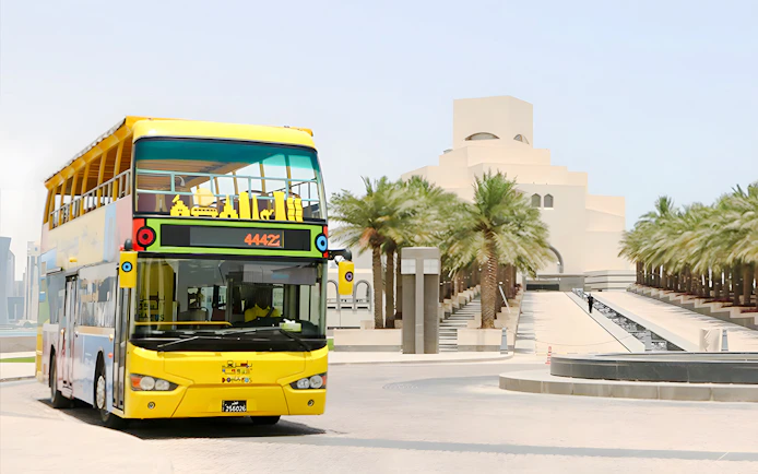 Open-top tour bus near Museum of Islamic Art in Doha.