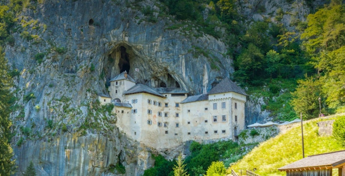 Predjama Castle nestled in a cliffside near Postojna, Slovenia.