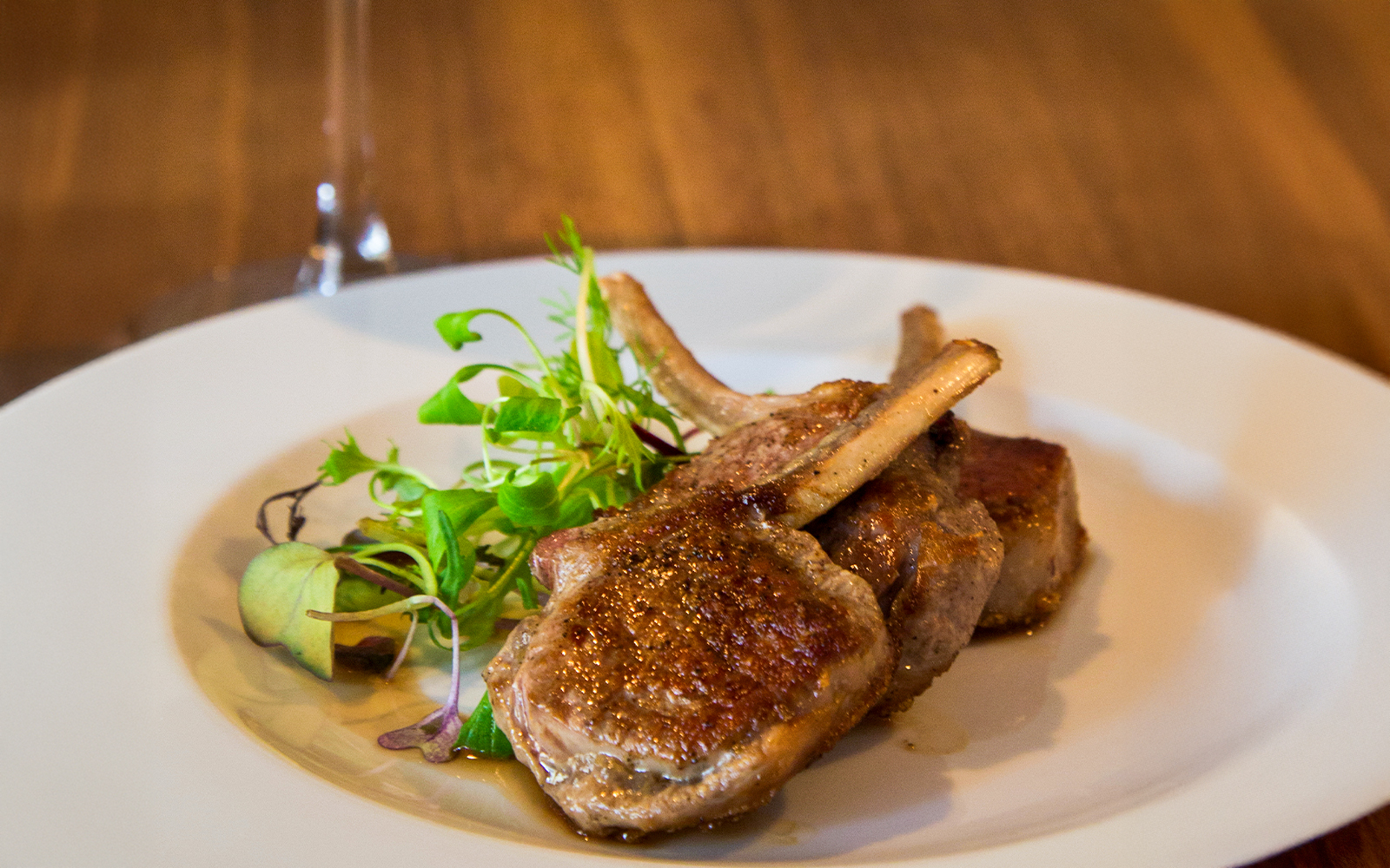 Grilled lamb served on a platter in a Rome restaurant.
