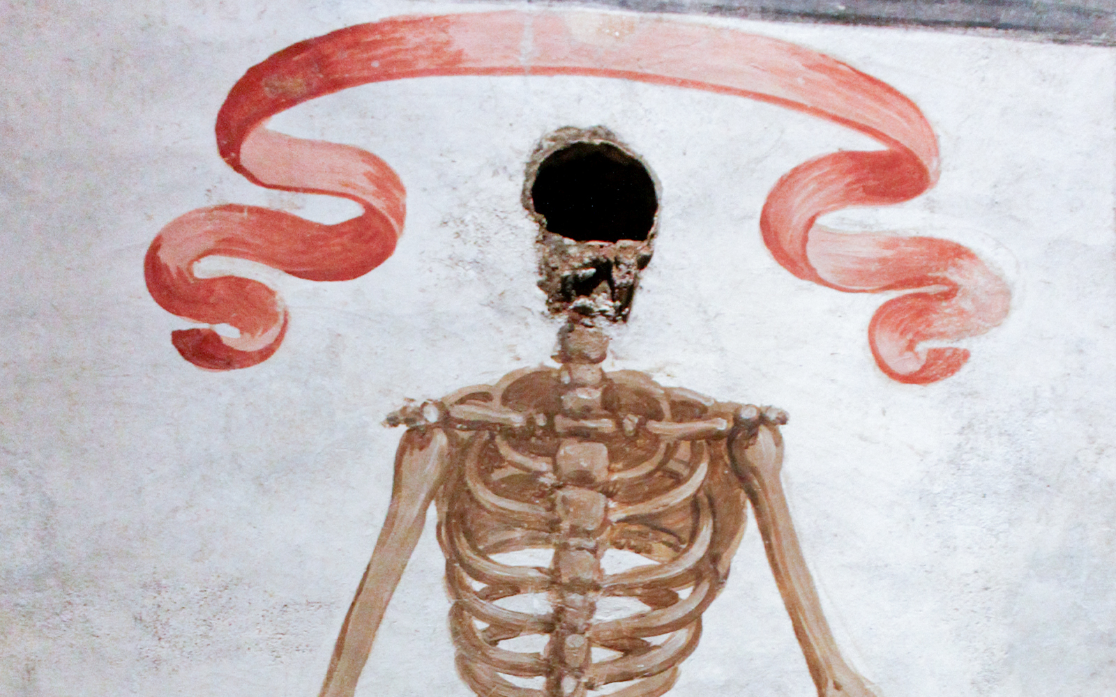Skeleton mural in Catacombs of San Gaudioso, Naples.