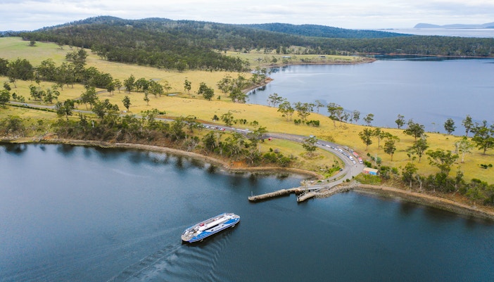 Bruny Island coastline with lighthouse, part of Hobart full-day guided tour.