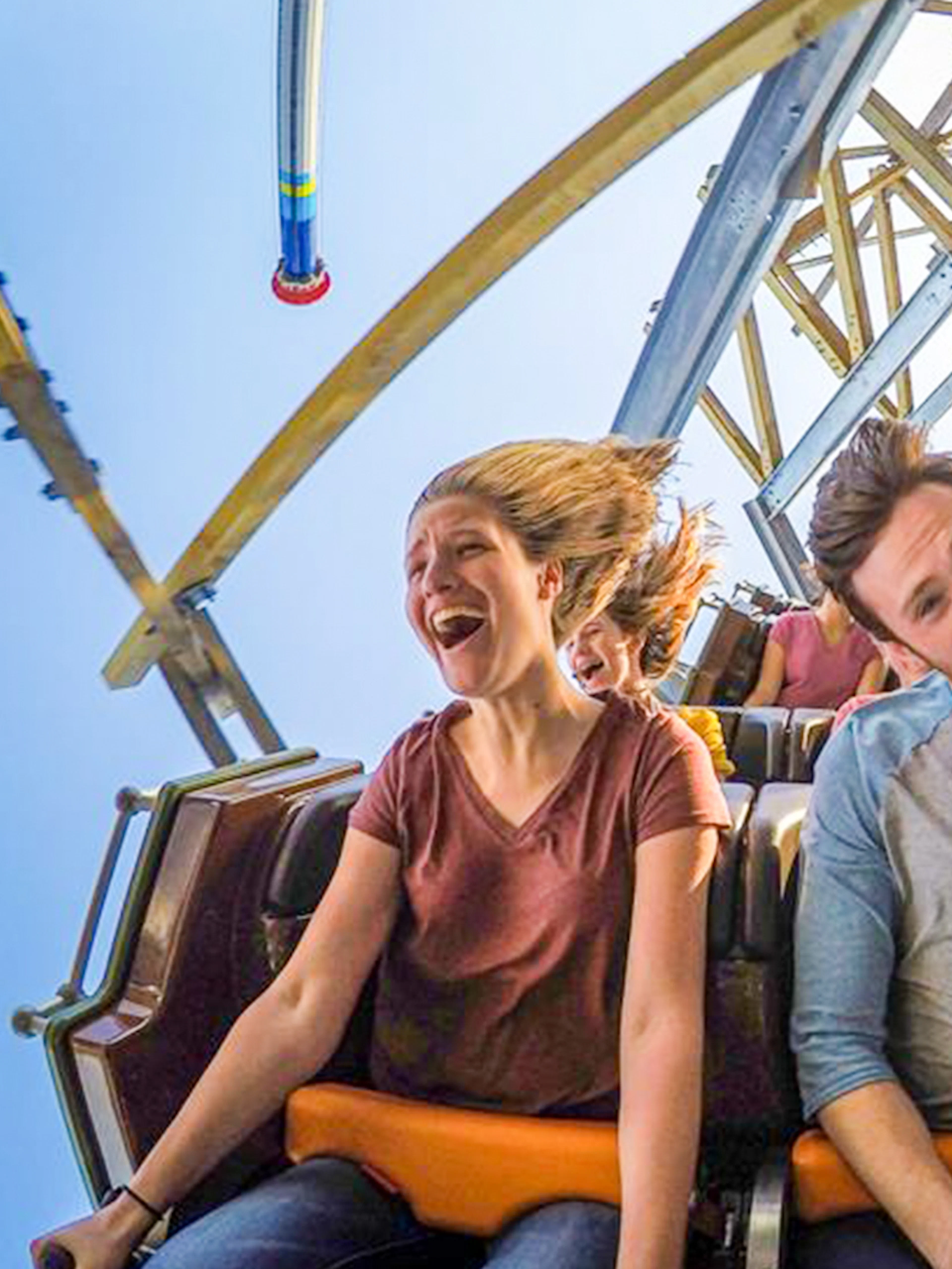 Riders enjoying the Twisted Timbers roller coaster at Six Flags King's Dominion.