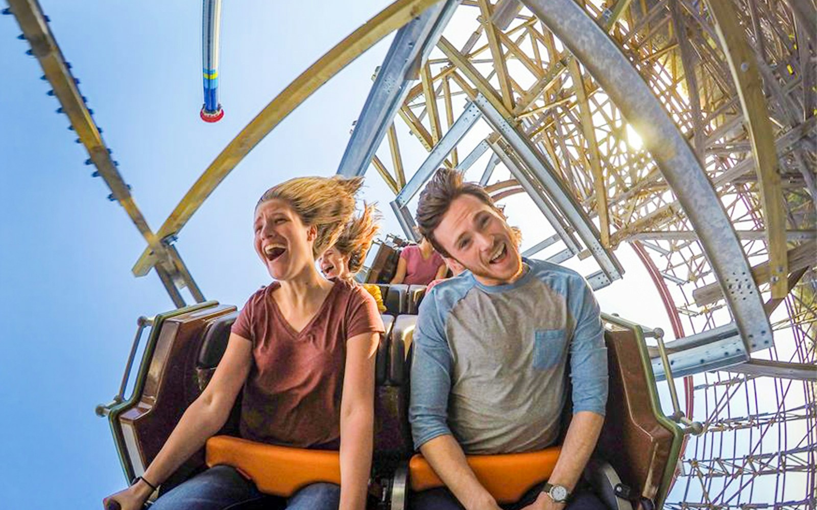 Riders enjoying the Twisted Timbers roller coaster at Six Flags King's Dominion.