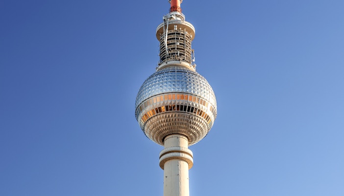 Berlin TV Tower against clear blue sky, Berlin, Germany.