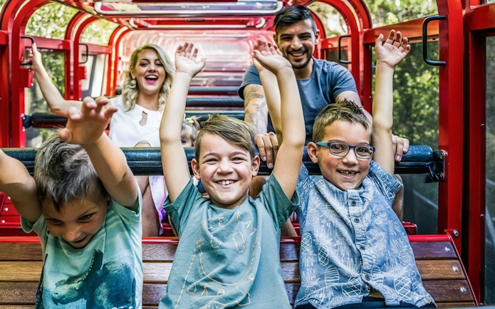 Family enjoying a ride on the forest railway at Scenic World, Blue Mountains.
