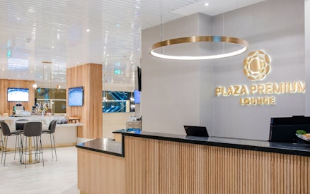 Plaza Premium Lounge reception and seating area at Vancouver International Airport (YVR).