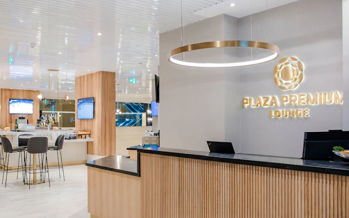 Plaza Premium Lounge reception and seating area at Vancouver International Airport (YVR).