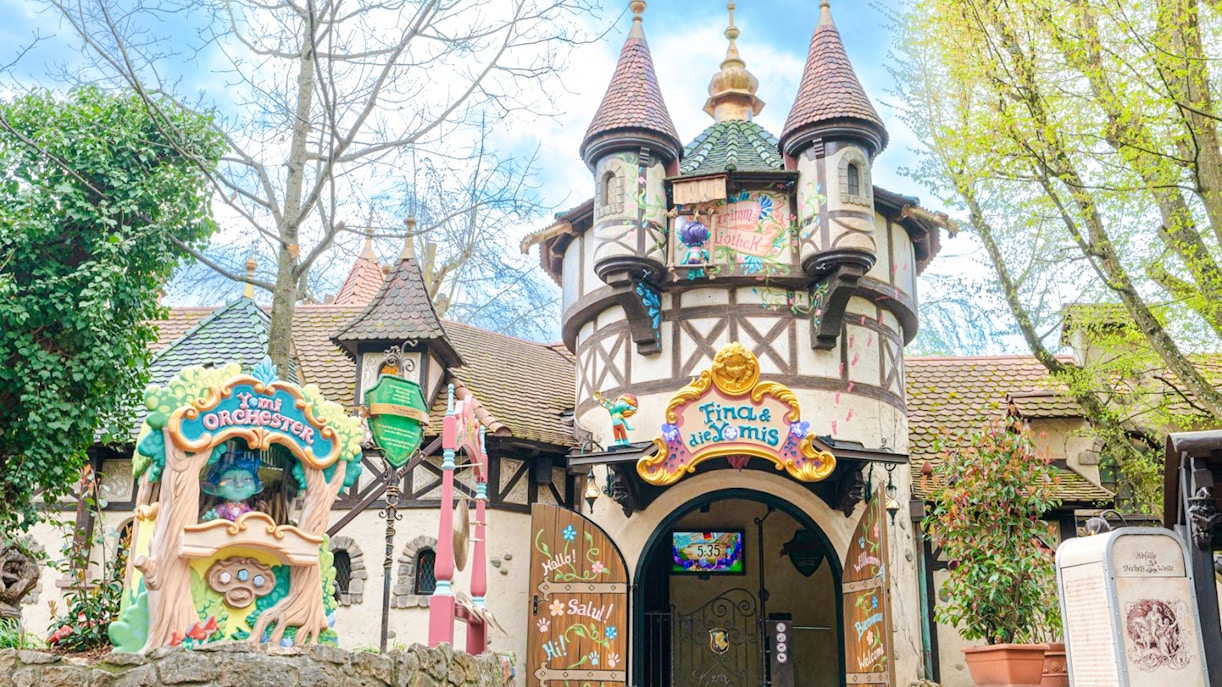Grimm's Fairytale Forest entrance at Europa Park with whimsical architecture.