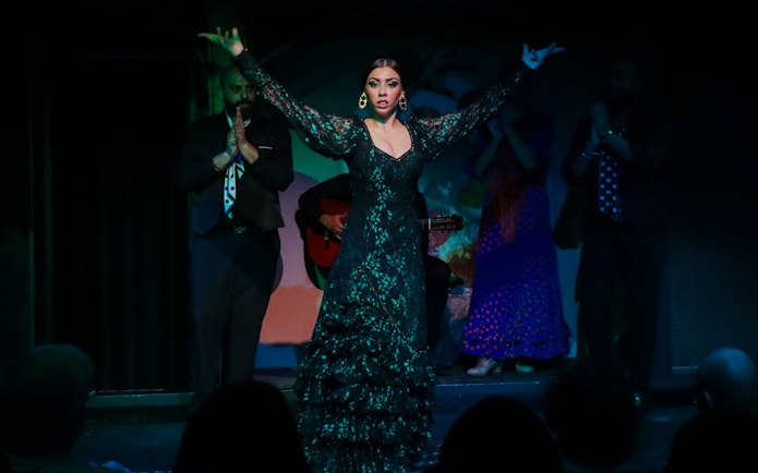 Flamenco dancer performing at El Duende by Tablao Cordobes show.