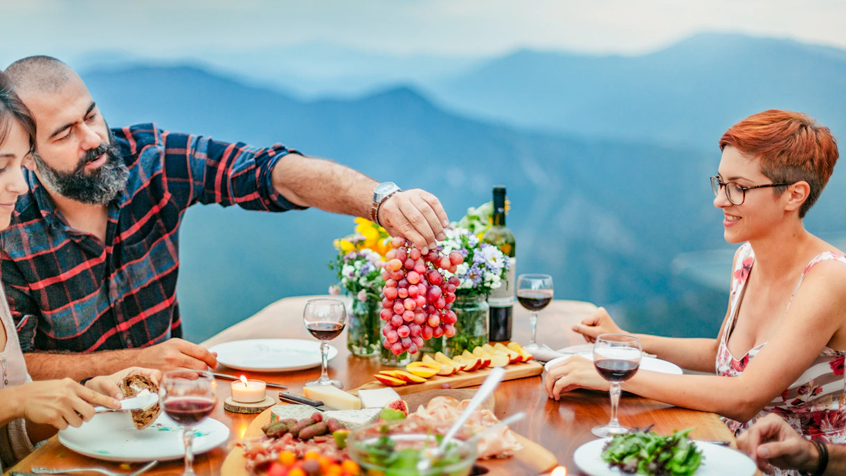 Dining experience at Panorama Restaurant Harder Kulm with mountain views.