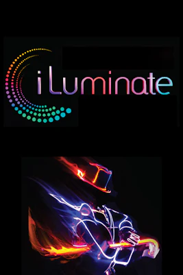 iLuminate dance performance with illuminated costumes in a dark theater setting.