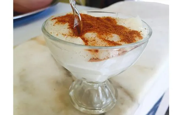 Traditional Egyptian dessert with cinnamon served on Old Cairo food tour.