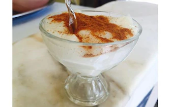 Traditional Egyptian dessert with cinnamon served on Old Cairo food tour.