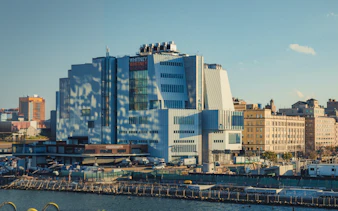 Whitney Museum of American Art exterior in New York City with surrounding buildings.