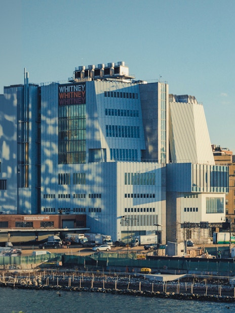 Whitney Museum of American Art exterior in New York City with surrounding buildings.