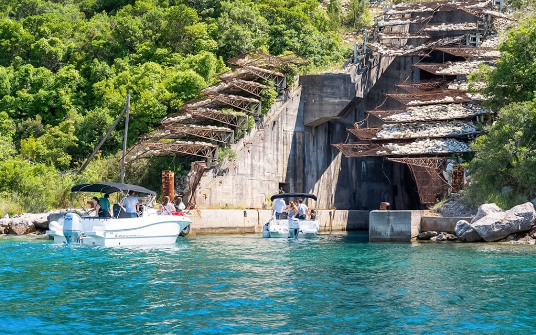 Speedboats near Submarine Canal entrance on Blue Cave & Bay of Kotor tour.