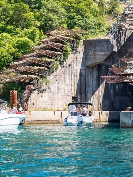 Speedboats near Submarine Canal entrance on Blue Cave & Bay of Kotor tour.
