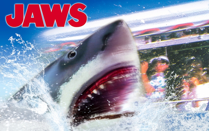 Jaws ride at Universal Studios Japan with shark emerging near boat, part of Universal Express Pass 4~Race&4-D~ experience.