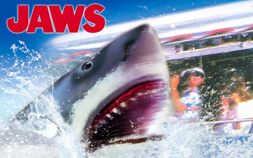 Jaws ride at Universal Studios Japan with shark emerging near boat, part of Universal Express Pass 4~Race&4-D~ experience.
