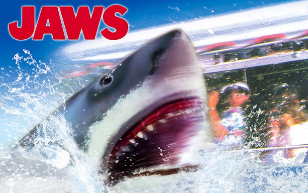 Jaws ride at Universal Studios Japan with shark emerging near boat, part of Universal Express Pass 4~Race&4-D~ experience.