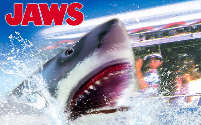 Jaws ride at Universal Studios Japan with shark emerging near boat, part of Universal Express Pass 4~Race&4-D~ experience.