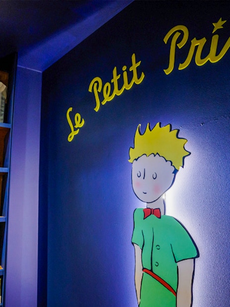 Little Prince illustration and book display in Lello Library, Porto.