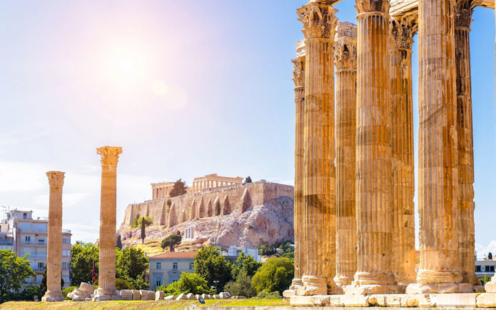 Temple of Olympian Zeus columns with Acropolis in the background, Athens.