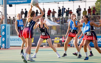 Women playing netball at Emirates Dubai 7s event.