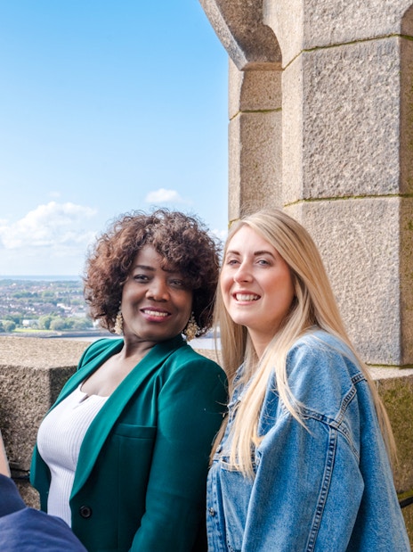 Guests posing for a photo at the Royal Liver Building in Liverpool.