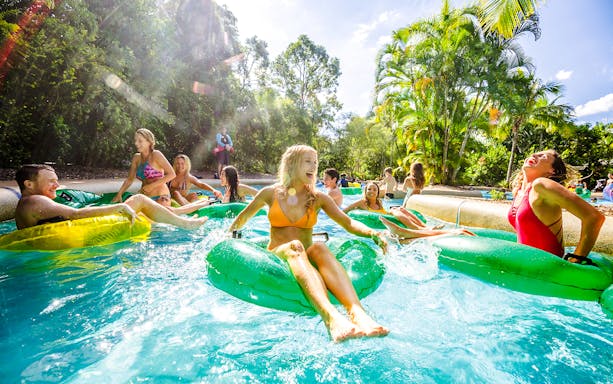 People enjoying a lazy river ride at Calypso Bay, Wet n Wild, Gold Coast.