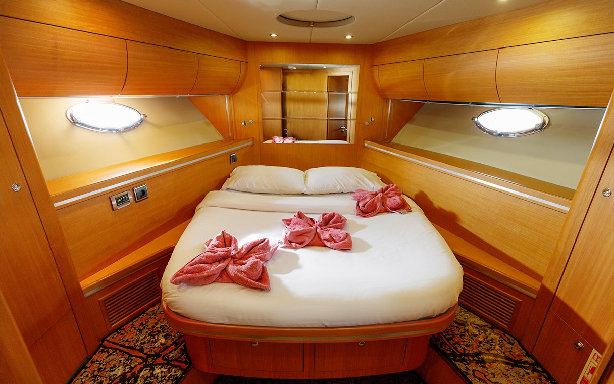 Luxurious cabin interior on a private yacht rental in Dubai.