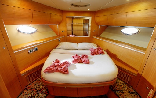 Luxurious cabin interior on a private yacht rental in Dubai.