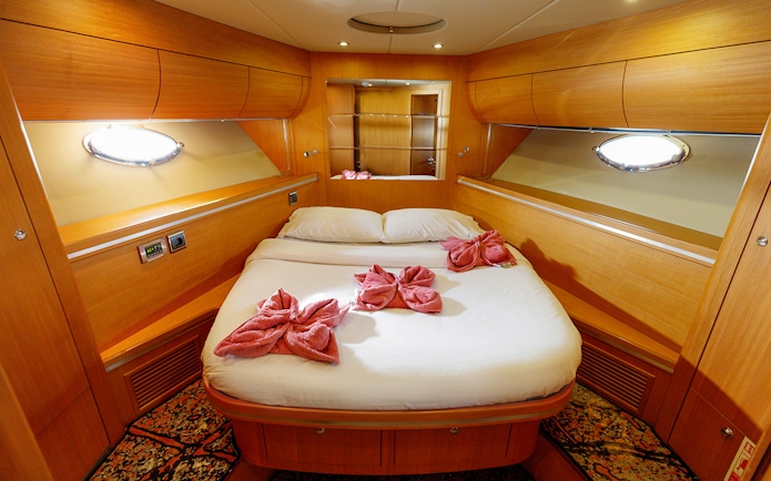 Luxurious cabin interior on a private yacht rental in Dubai.