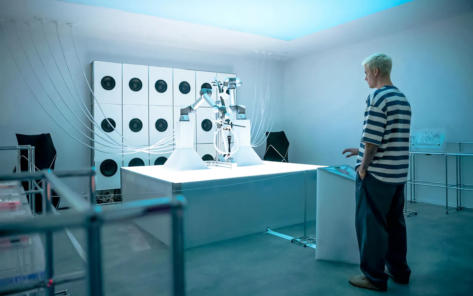 Robotic arm playing cello at Mercer Labs Museum of Art exhibit.